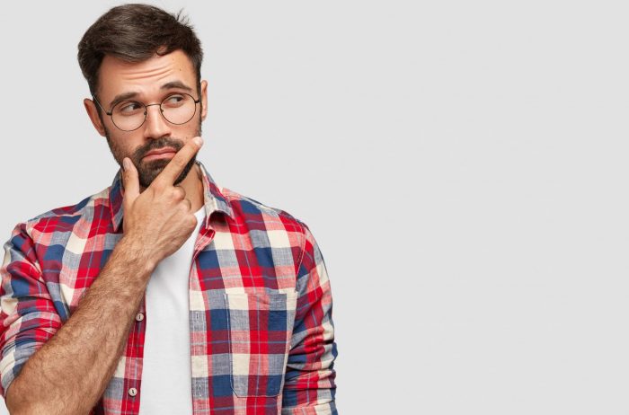 Photo of man touching his chin illustrates blog "Can I Pawn the Same Item Twice?"