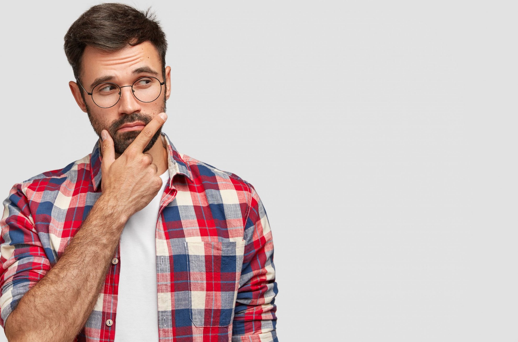 Photo of man touching his chin illustrates blog "Can I Pawn the Same Item Twice?"
