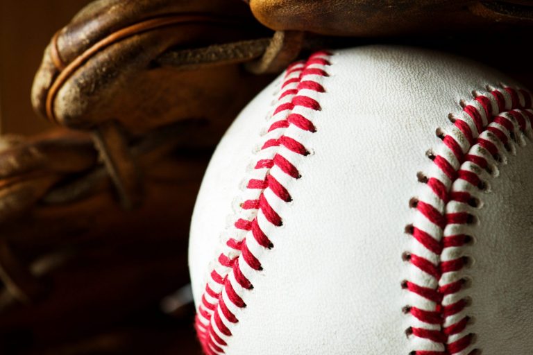 Closeup of baseball illustrates blog "Do Pawn Shops Take Sports Memorabilia?"