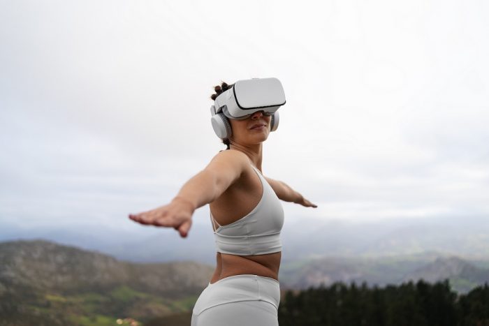 VR-headset-freepik Woman wearing VR headset illustrates blog "Can You Pawn a VR Headset?"