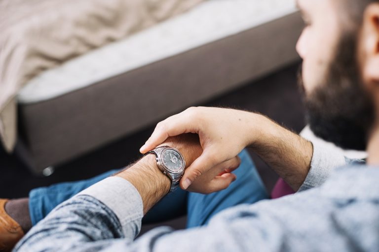 Man looking at his watch.