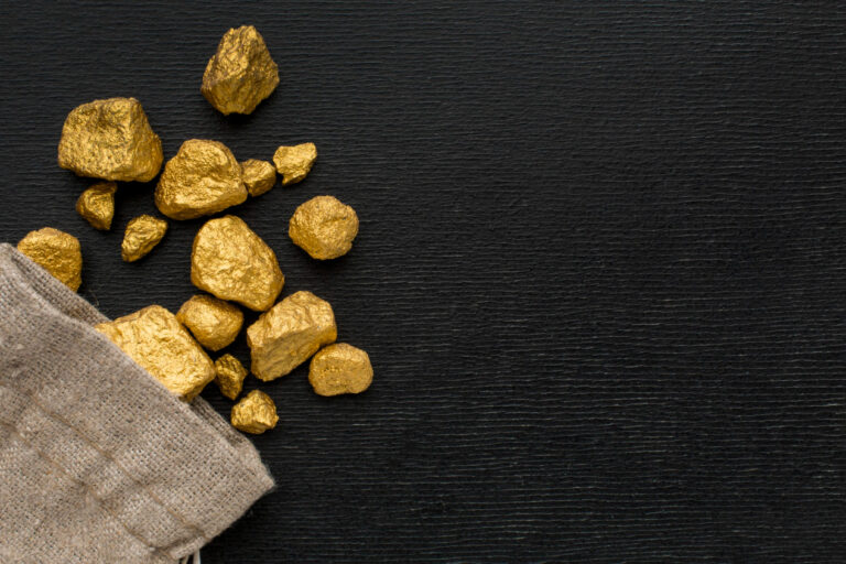 Close-up of gold karat markings on a necklace