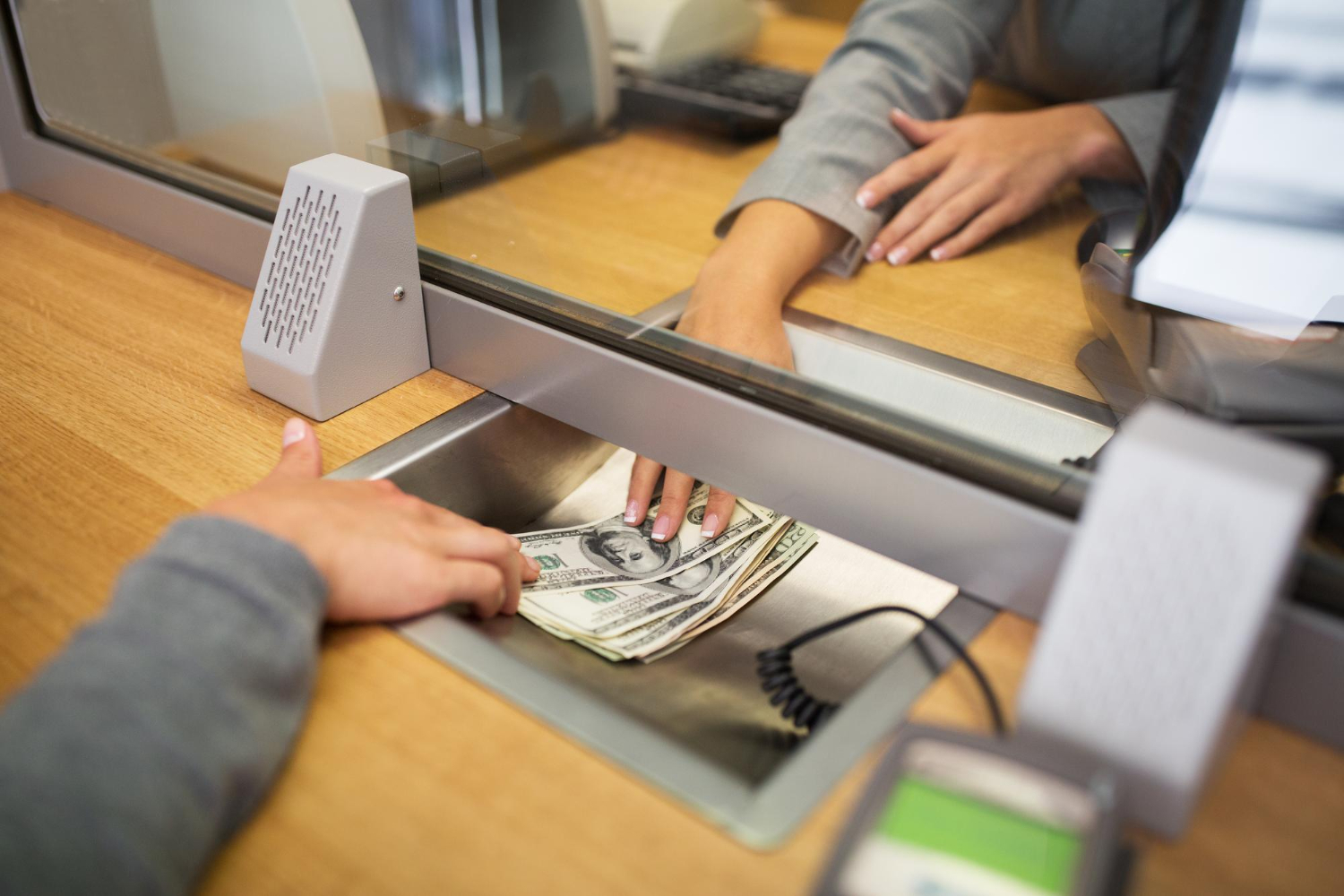 160481 "customer getting cash for collateral loan at pawn shop